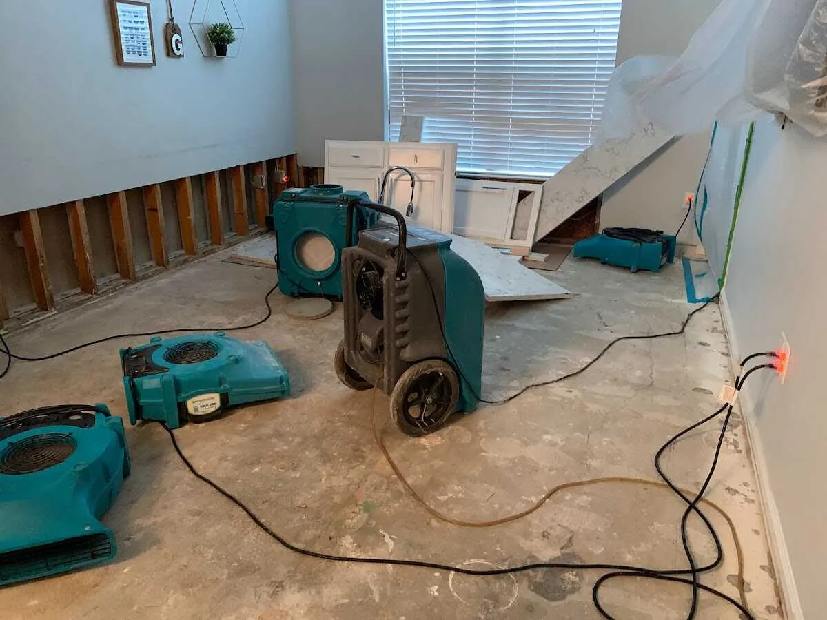 Dehumidifier in flood-cut room for Water Damage Restoration in Davison